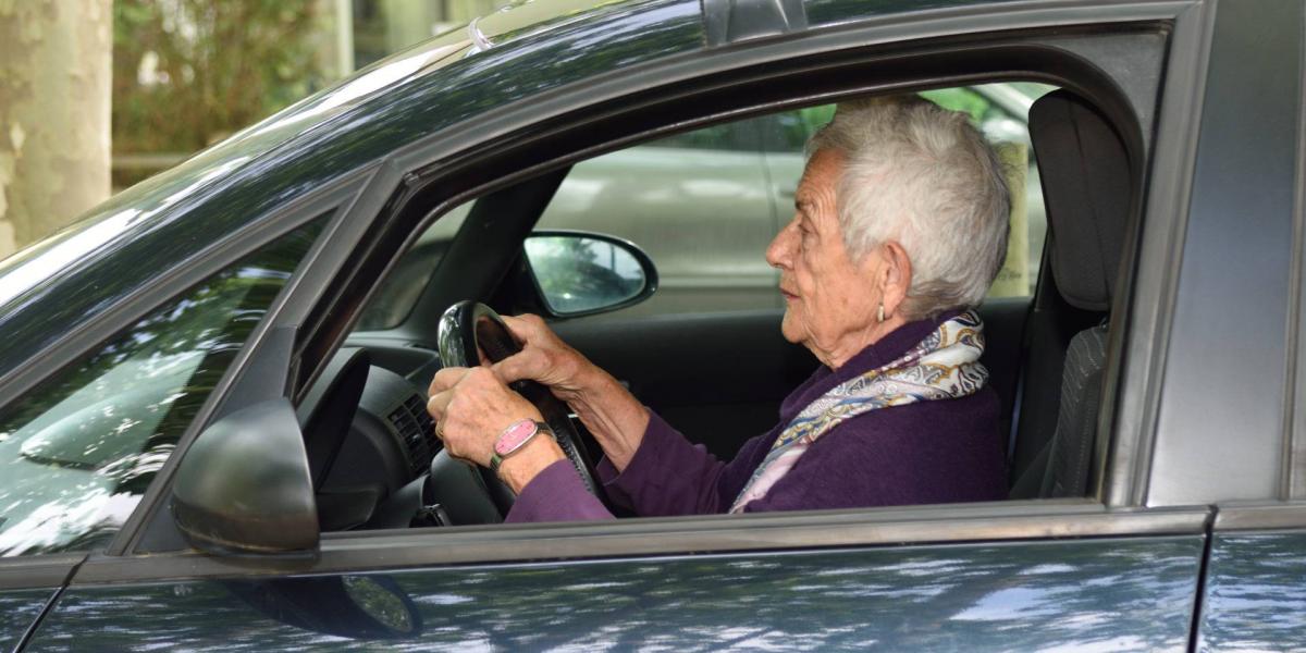 Senior,Woman,Driving,A,Car