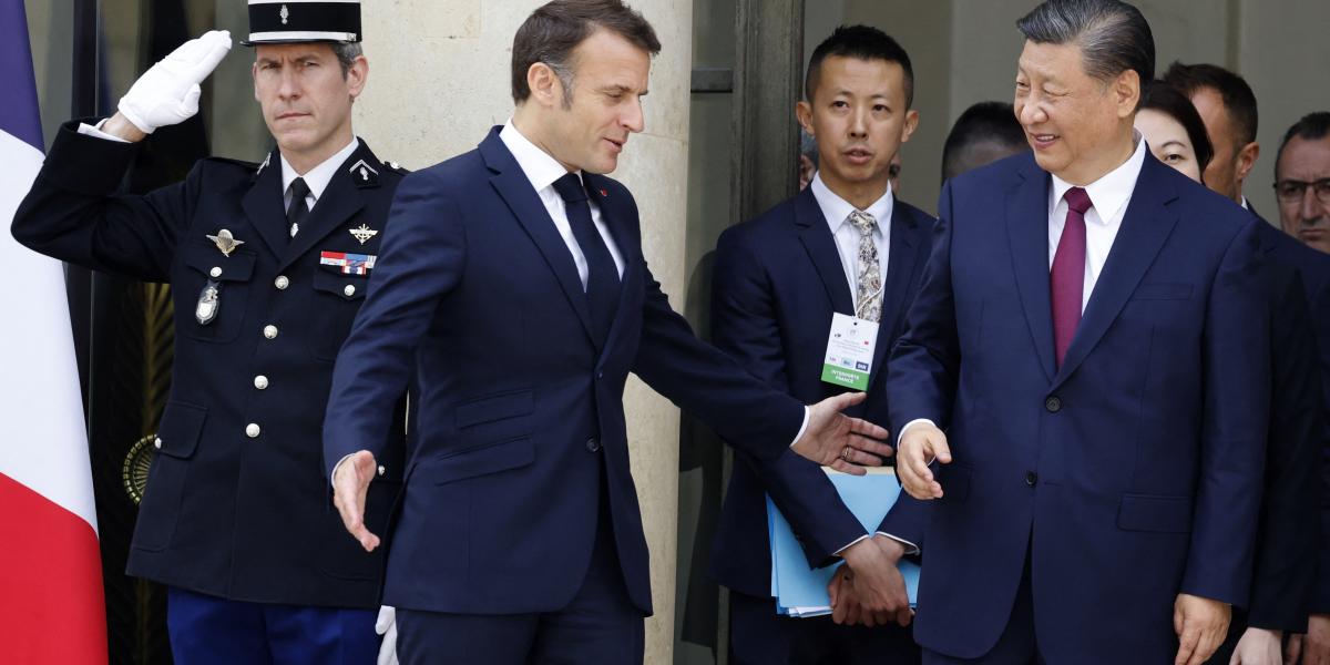 Macron az Élysée-palotában győzködte Hszi Csin-ping elnököt