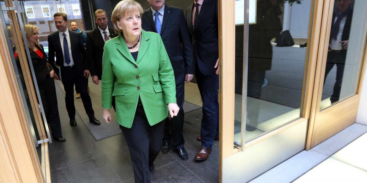 Angela Merkel zöld-feketében érkezett a sajtóértekezletre FOTÓ: EUROPRESS/GETTY IMAGES/ADAM BERRY