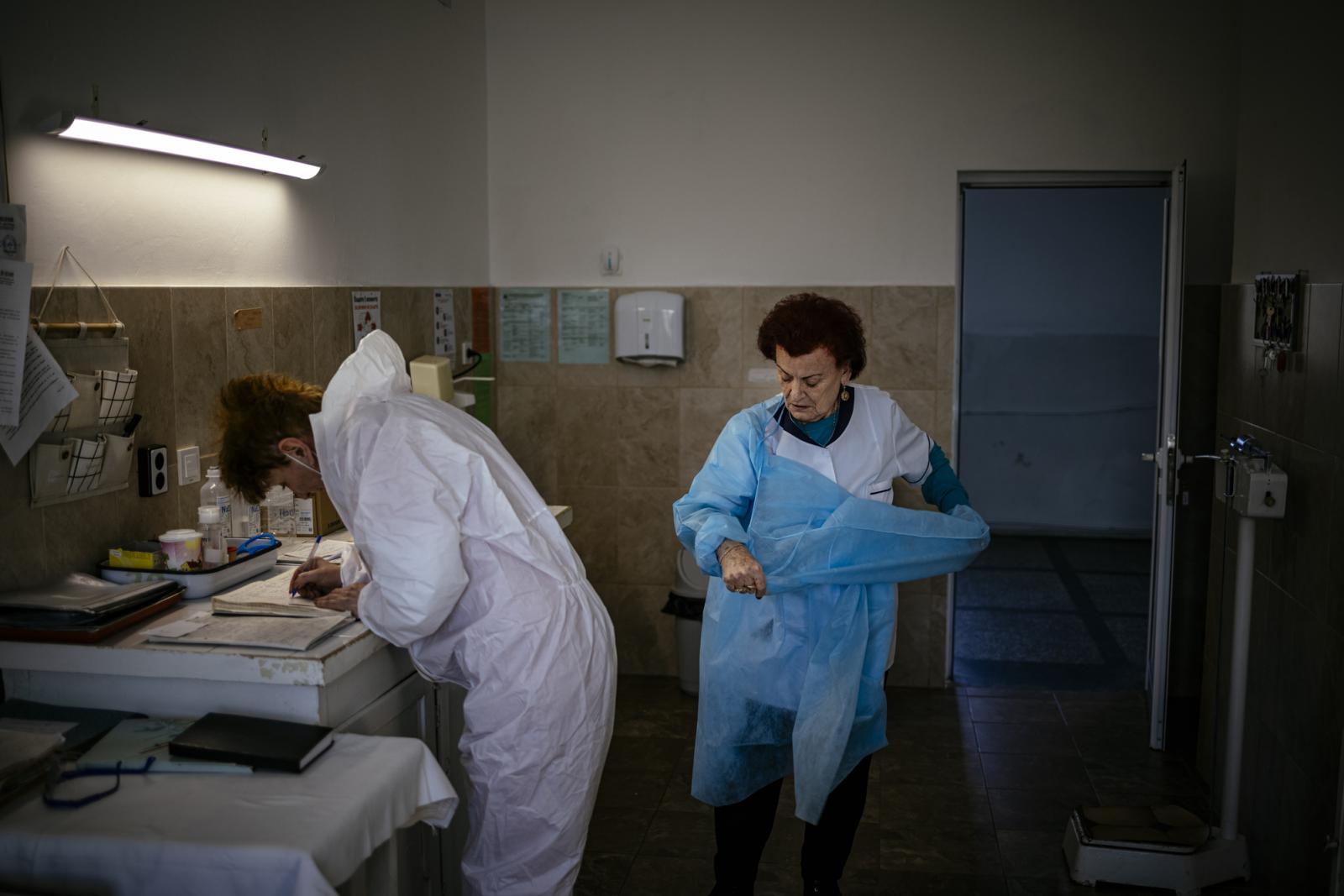 This picture taken on January 20, 2021 shows Bulgarian Infection disease specialist Dr Maria Bogoeva, 82, taking a short break during her shift in a Covid-19 unit in the hospital of Doupnitsa, a municipality with 50,000 inhabitants which is desperately la