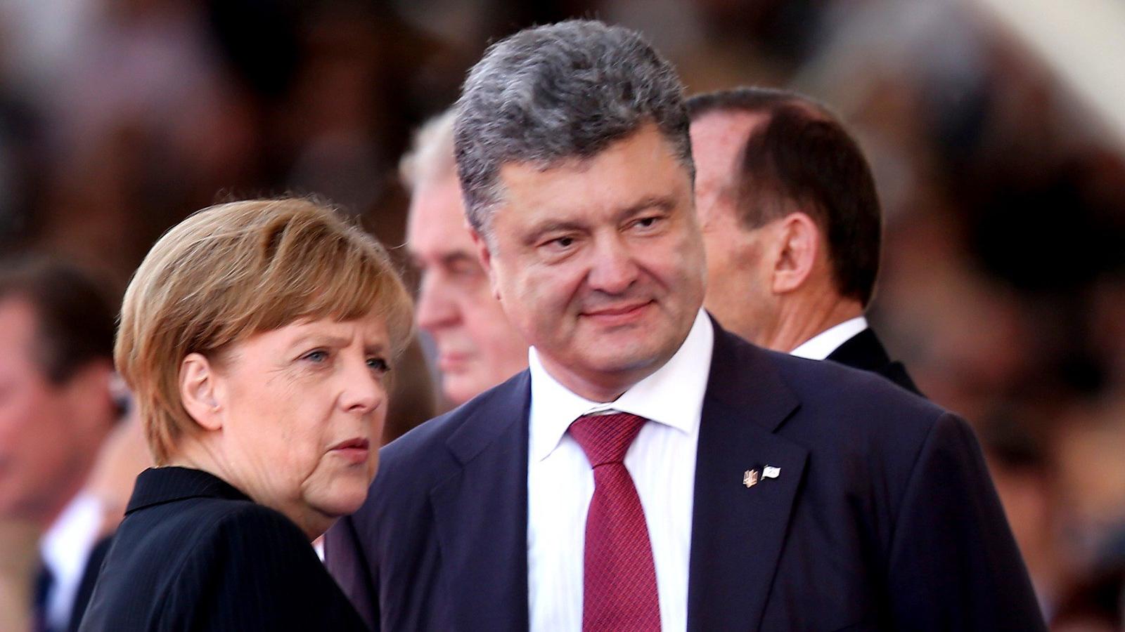 Merkel és Porosenko/Getty Images