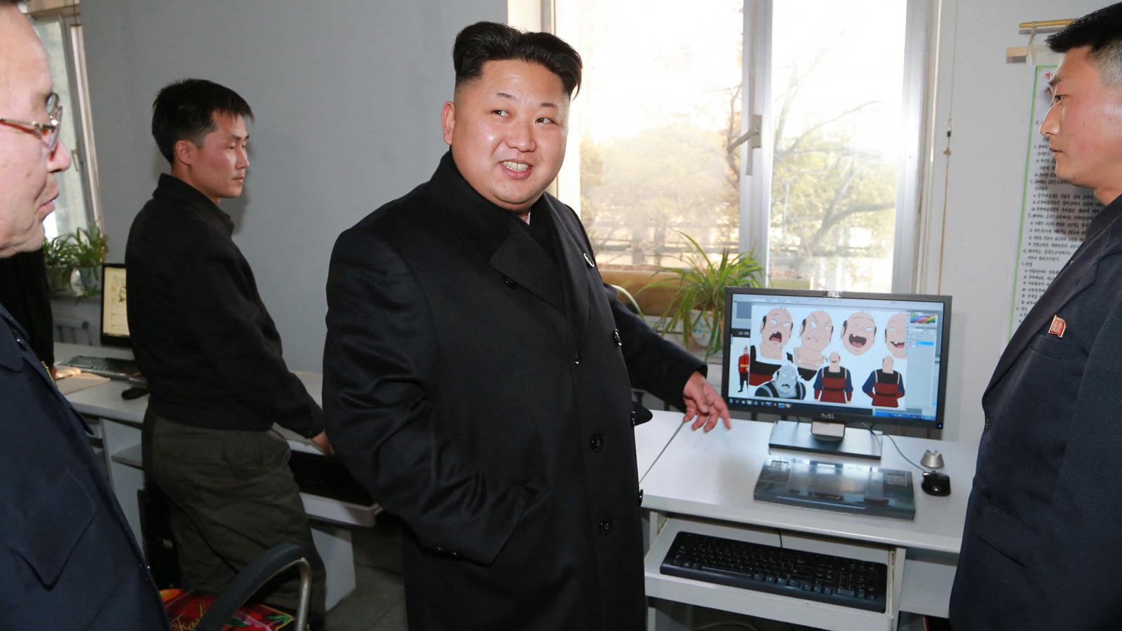 Kim Dzsongun egy meg nem nevezett észak-koreai rajzfilm-stúdióban 