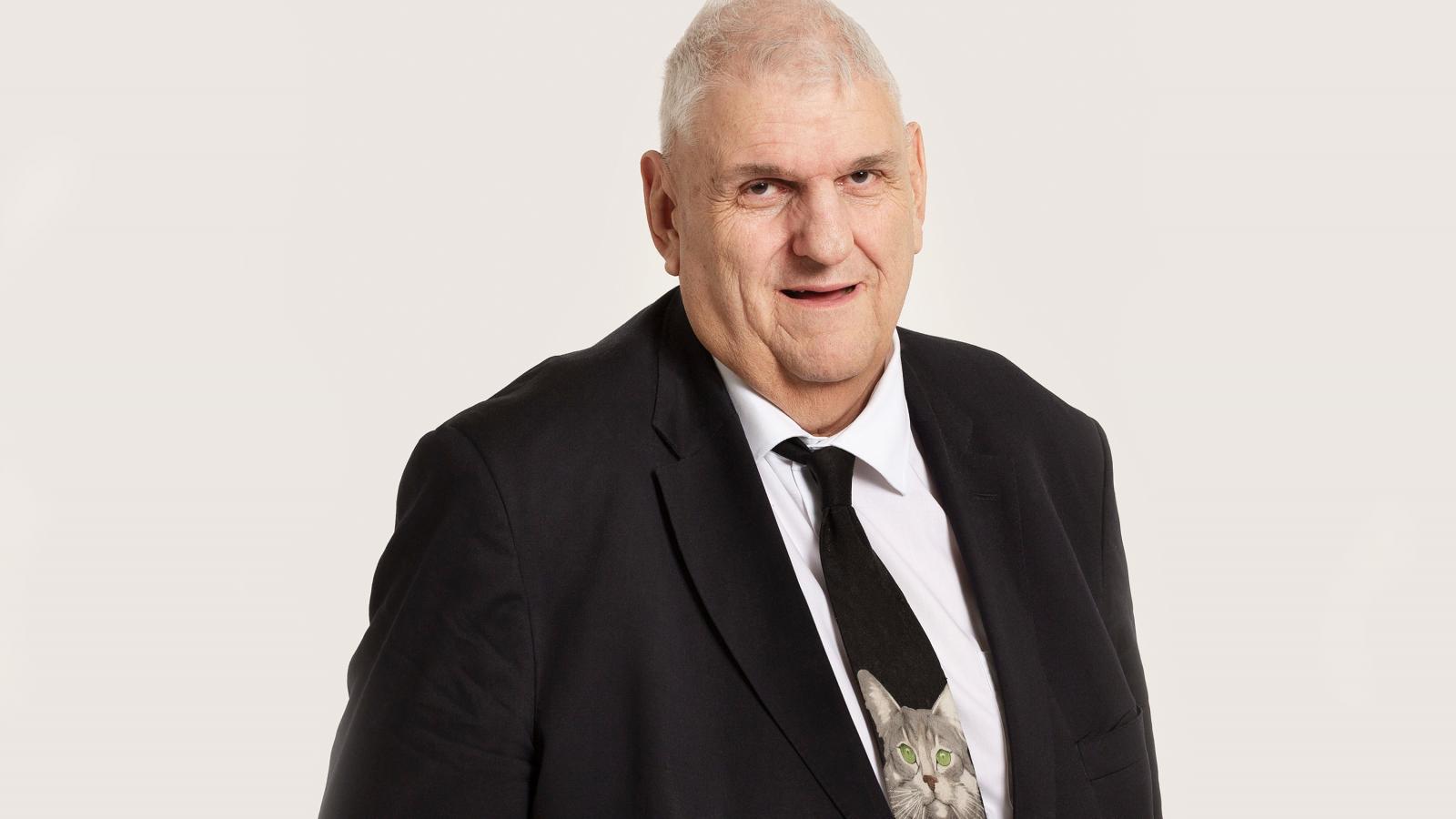 Daniel Brélaz névjegye egy macskát és egy számítógép egeret ábrázoló széles nyakkendő volt.