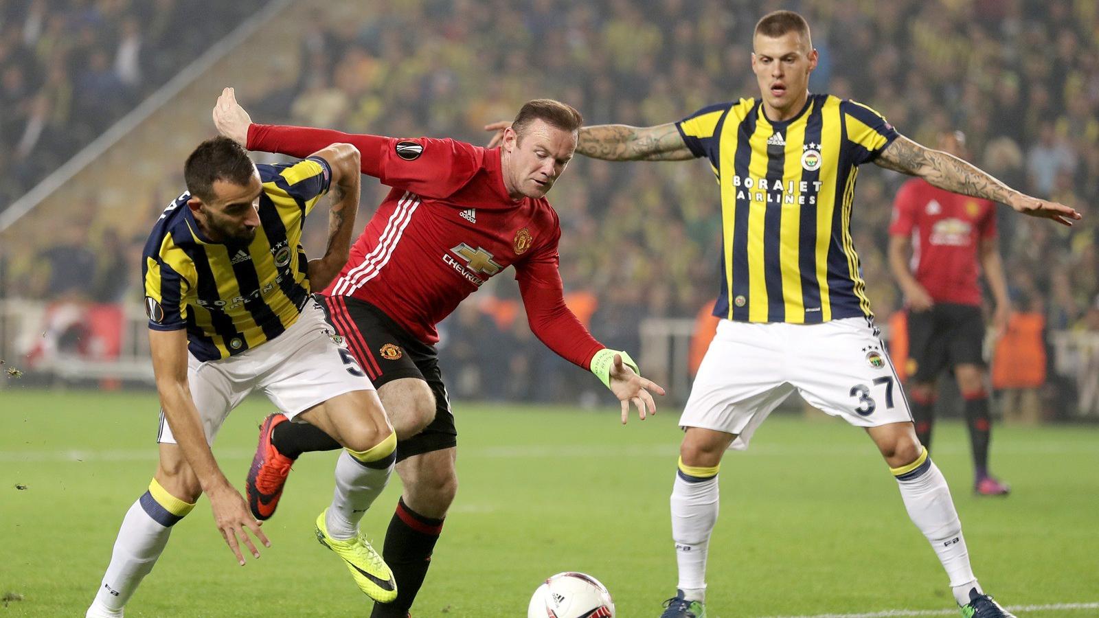 Wayne Rooney és Mehmet Topal. FOTÓ: Chris McGrath/Getty Images