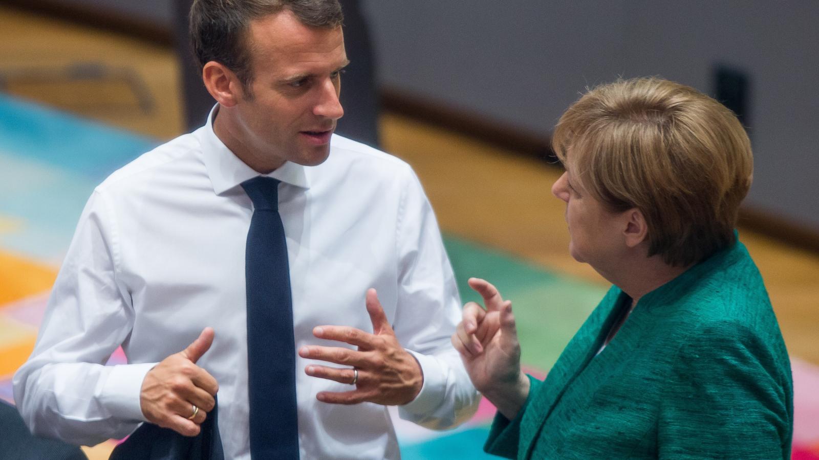 Macron-Merkel párbeszéd - FOTÓ: STEPHANIE LECOCQ/AFP