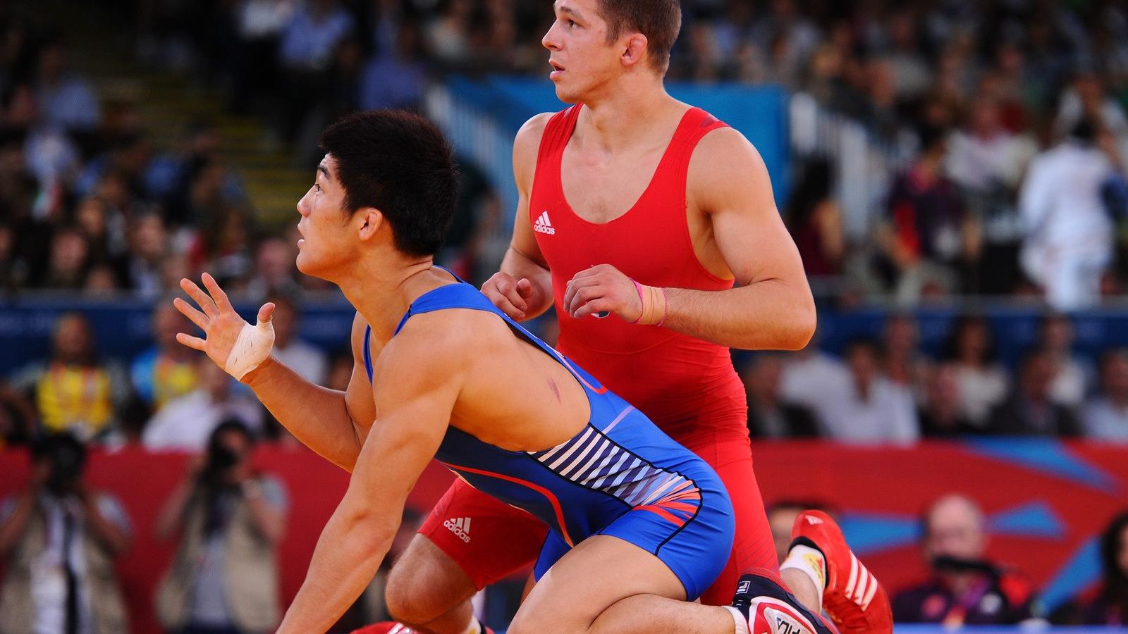 Lőrincz Tamás a londoni olimpián, a koreai Hyeonwoo Kimmel. Fotó Mike Hewitt, Getty Images.